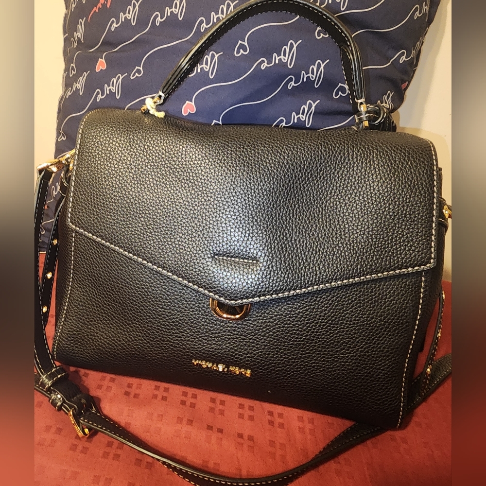 Michael Kors black pebbled leather handbag with crossbody strap